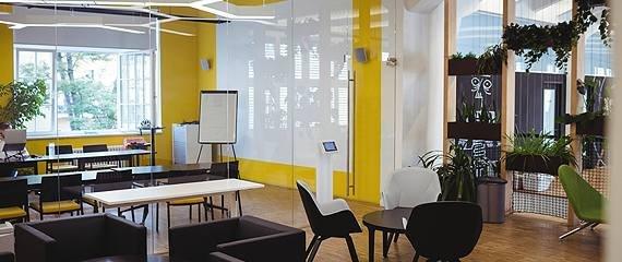 Professionals working in a modern WurkZone workspace